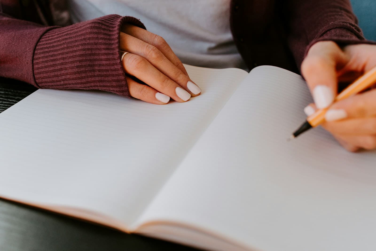 An open paper journal ready for notes